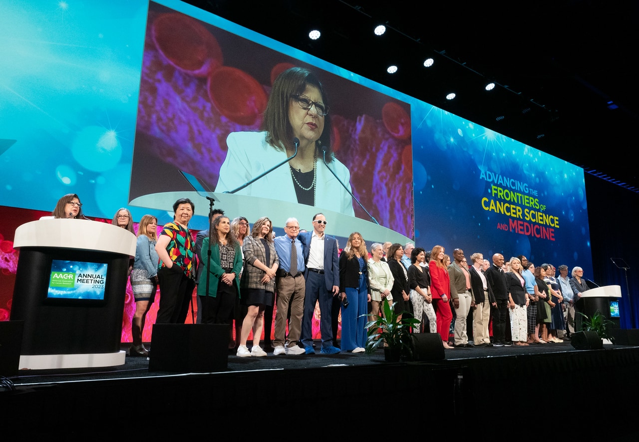 Patient advocates on stage during the Opening Ceremony at the AACR Annual Meeting 2023